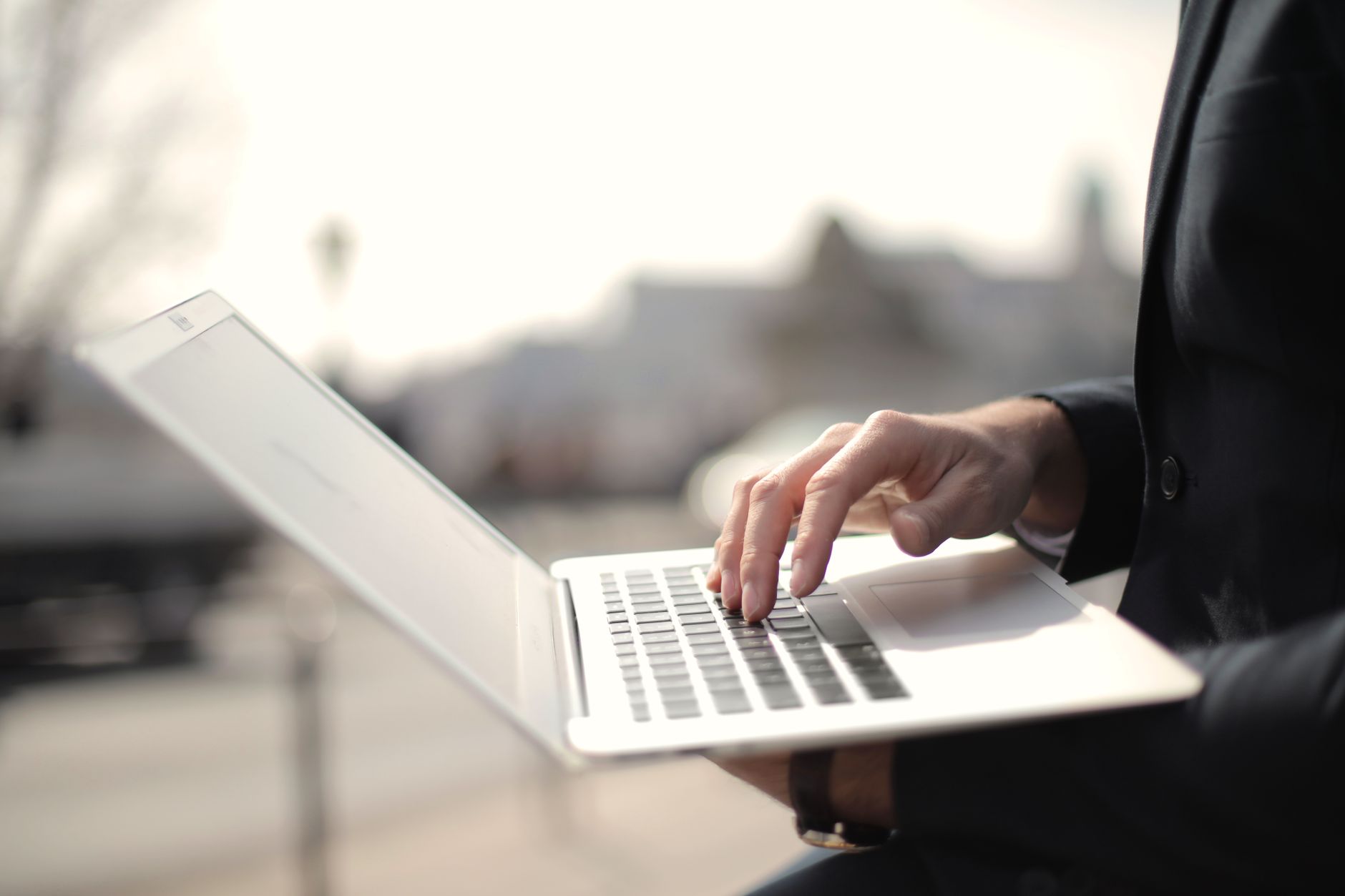 Person using a laptop to search for answers online, illustrating Perplexity AI