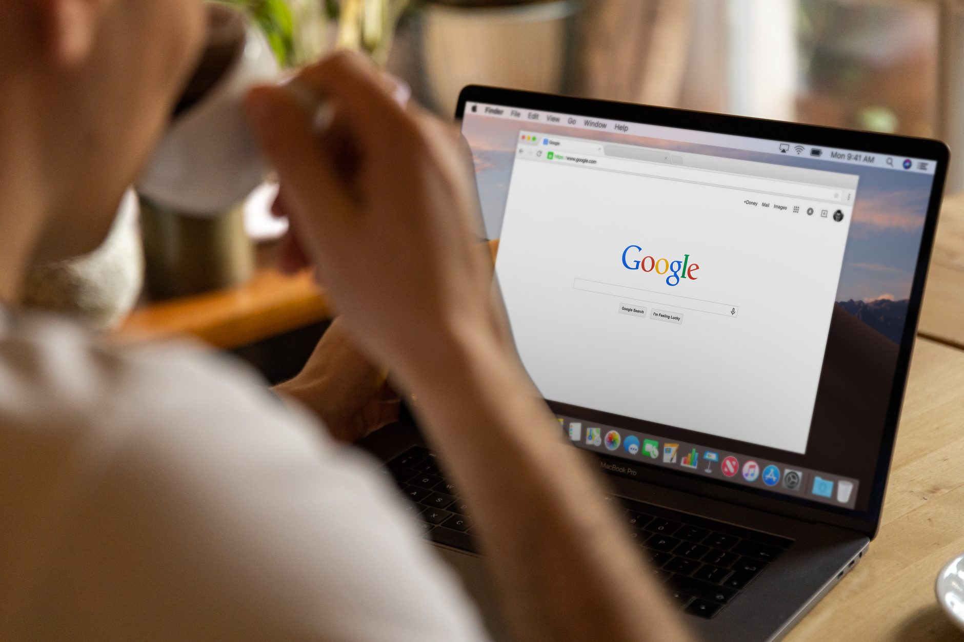 Person browsing the web on a laptop